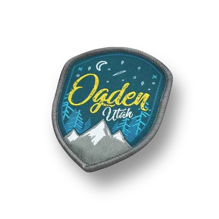 Woven label patch with fine thread detail and small lettering