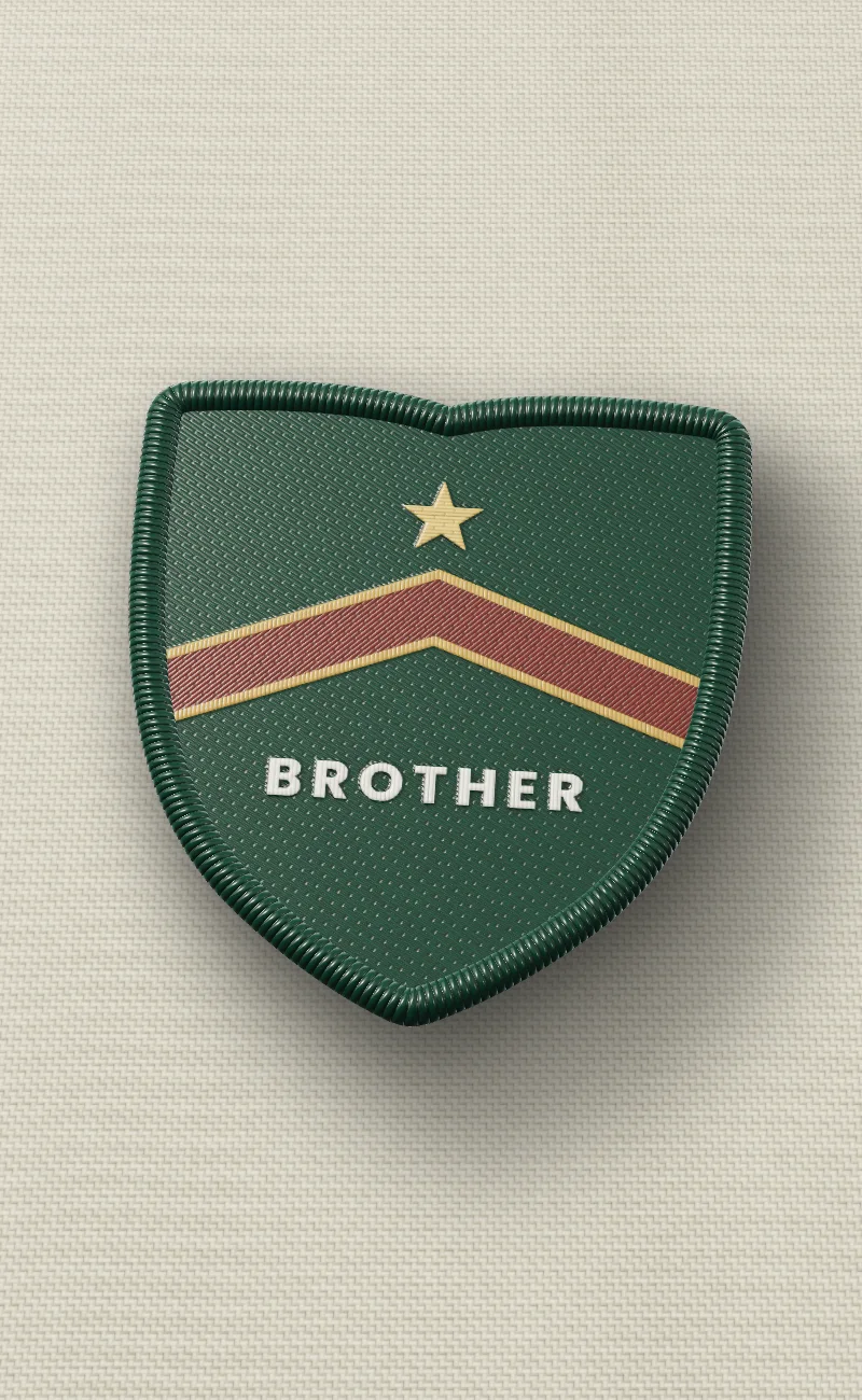Club Crest: embroidered patch on cream canvas